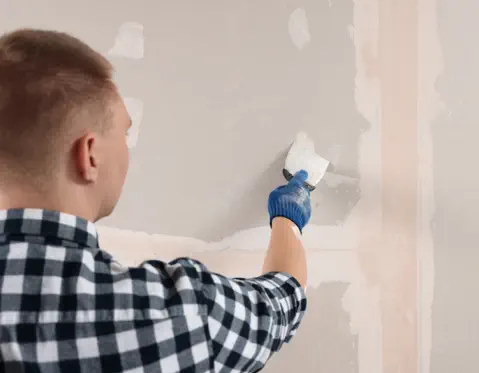 Closeup of a man's hands, handcuffed behind his back